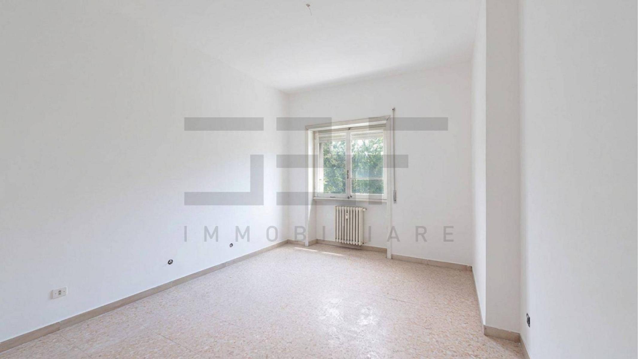 Camera da letto - Appartamento In Affitto A Roma