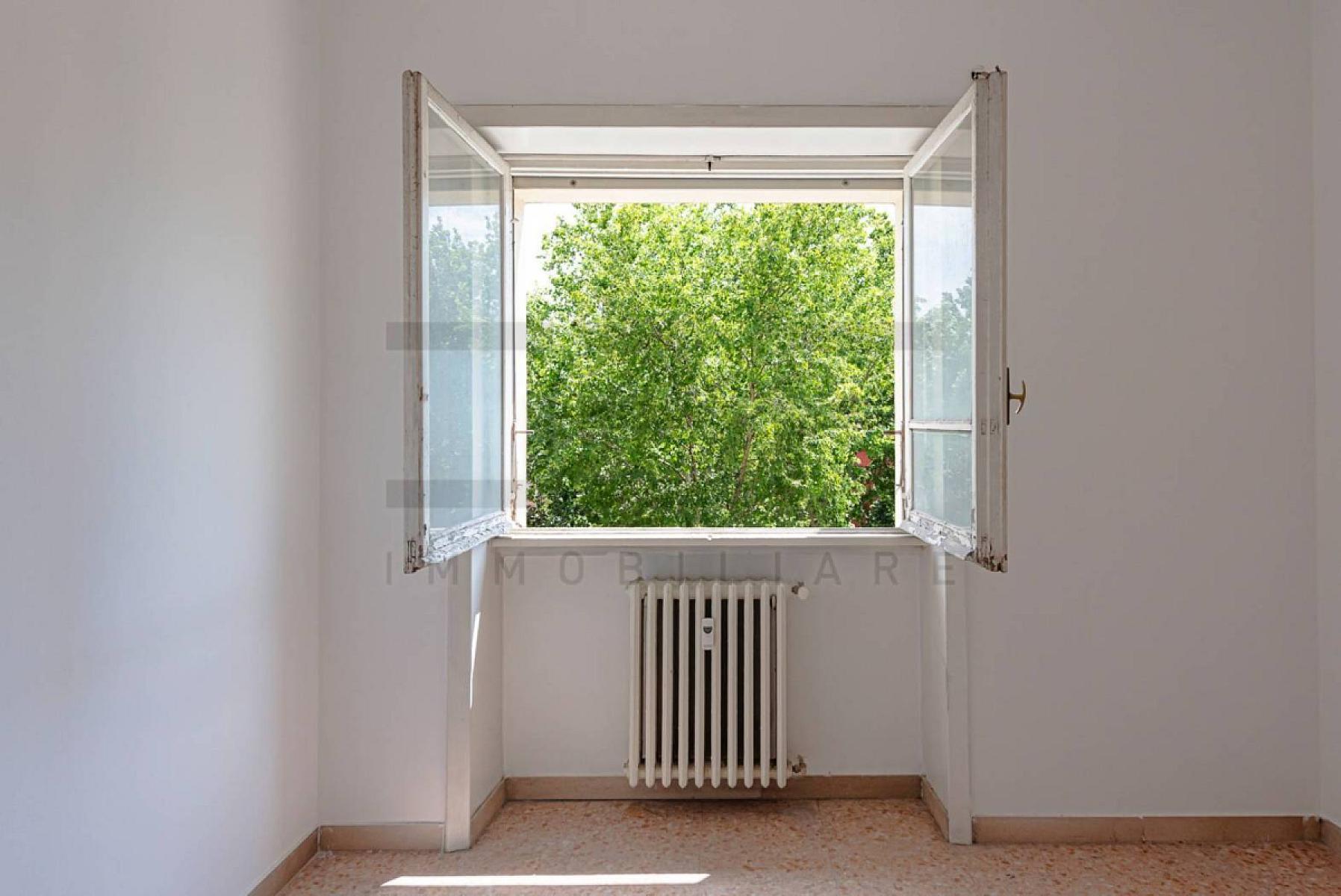 Camera da letto - Appartamento In Affitto A Roma