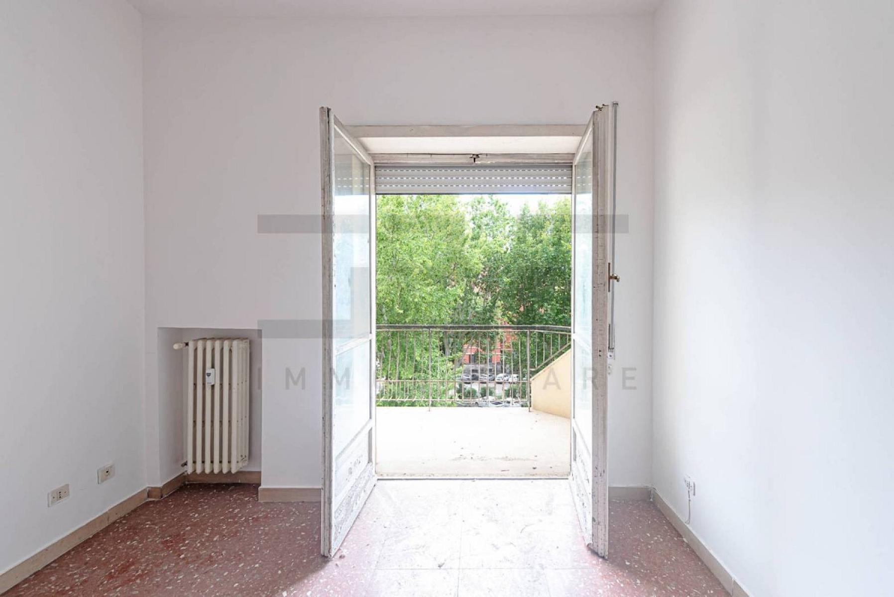 Stanza non arredata - Appartamento In Affitto A Roma